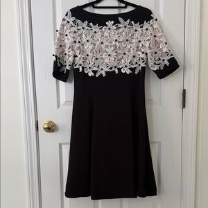 Elegant Black Midi Dress with White Lace Overlay